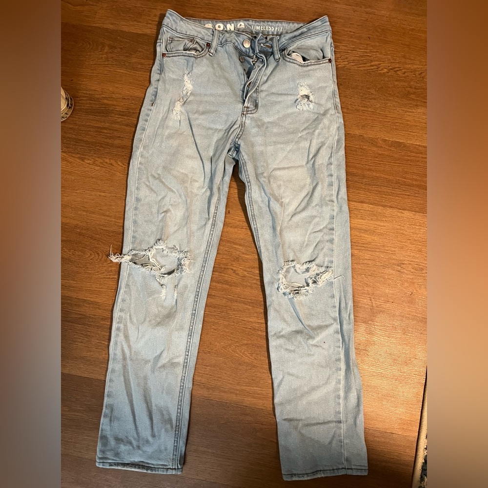 Distressed Light Blue Jeans